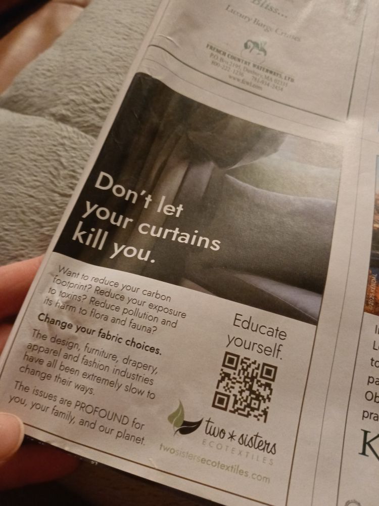 Photo of an ad in a magazine. The header, in white text against a dark image of a sofa and some curtains, reads "Don't let your curtains kill you".
