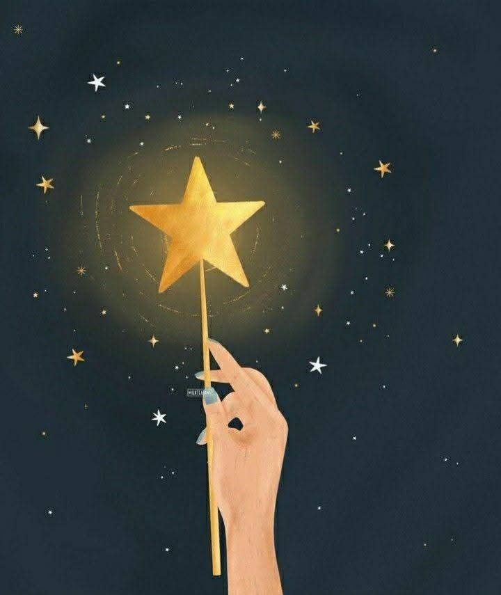 A hand holding a star