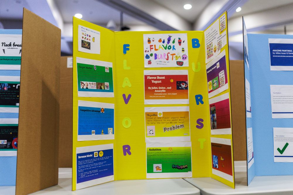 A child's colorful project board has information about flavor bursts.