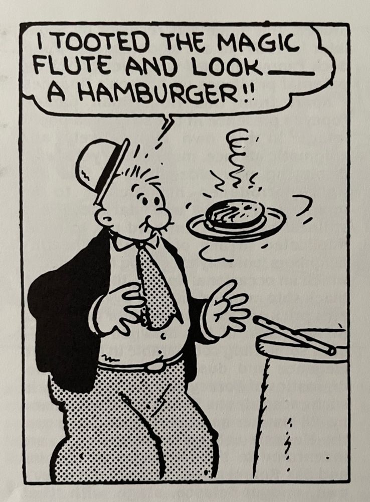 Comic strip art by EC Segar featuring a surprised J. Wellington Wimpy with his hat popping off and a hamburger on a plate floating in front of him, and there's a flute on the table. Wimpy is saying "I tooted the magic flute and look—a hamburger!!"
