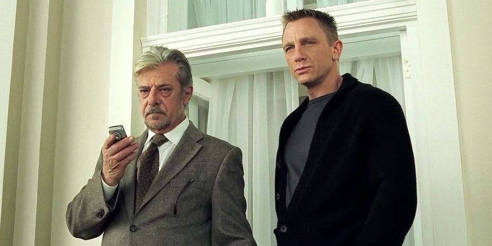 Giancarlo Giannini just two years later with distinguished gray hair and a gray goatee standing next to Daniel Craig in Casino Royale (2006), see, you do know who he is