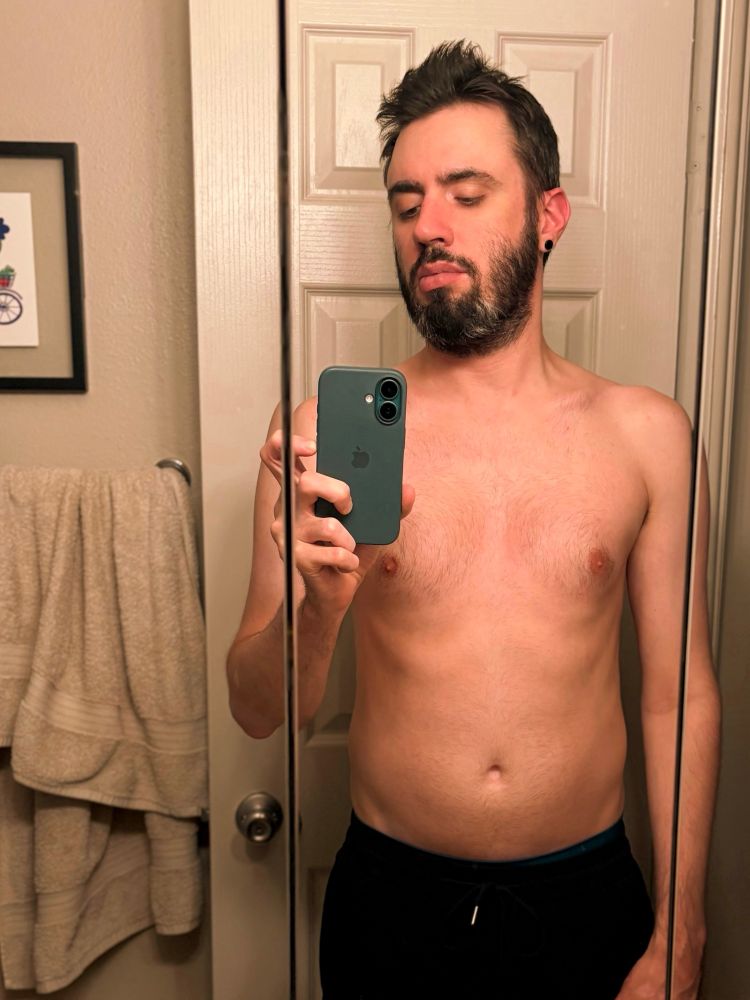 standard bathroom shirtless mirror selfie