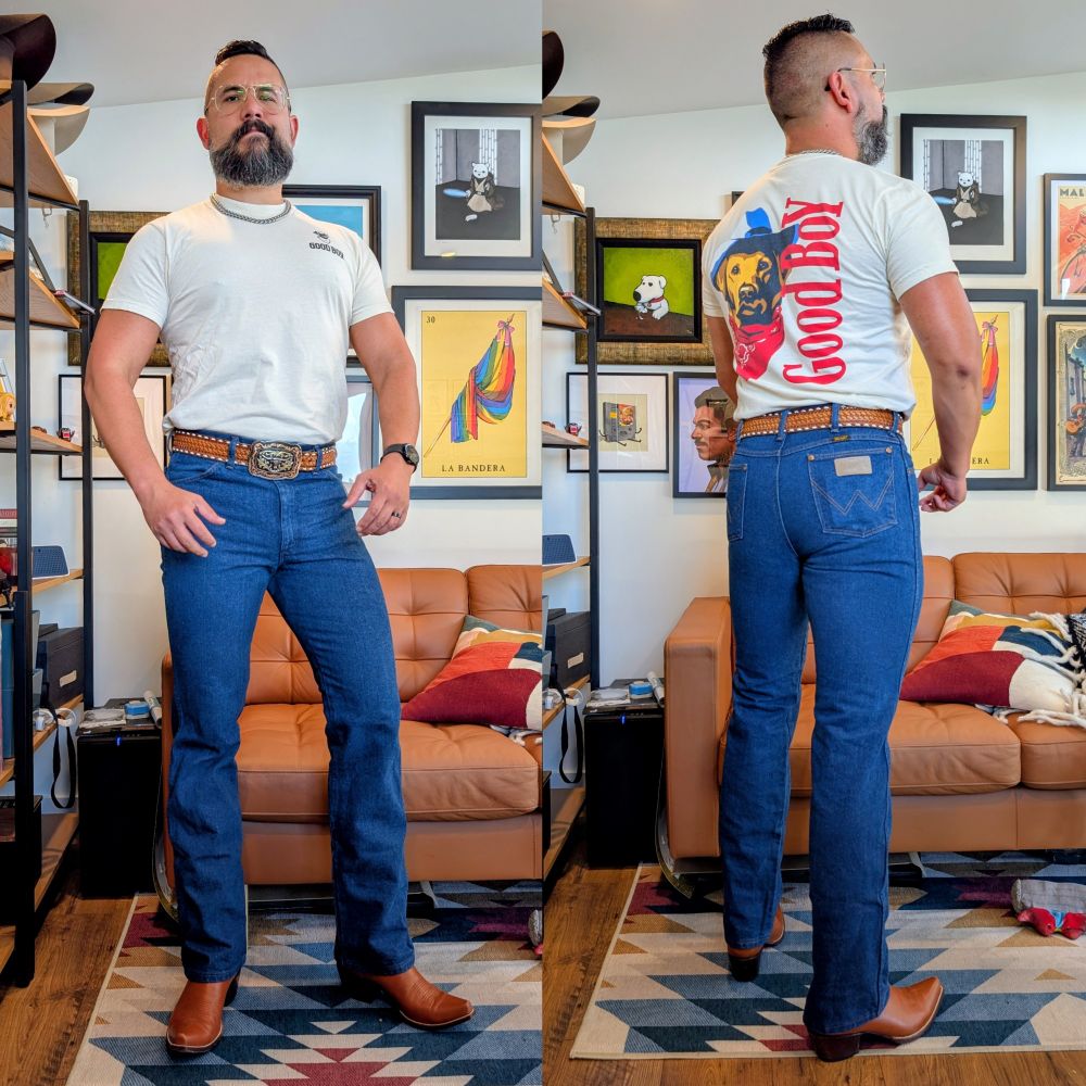 A collage of two side by side photos

Left side: Jorge a Latino man with a beard wearing blue Wrangler jeans and an off white T-shirt. The jeans are sitting higher on his waist. He's wearing reddish brown cowboy boots and a brown belt with a western buckle. He is facing the camera. 

Right side: Jorge facing away from the camera and his backside can be seen. The off white T-shirt has a drawing of a dog with a bandana and a cowboy hat. GOOD BOY is printed verically next to the dog. The Wrangler leather tag on the right back pocket is seen on the back of the jeans. 