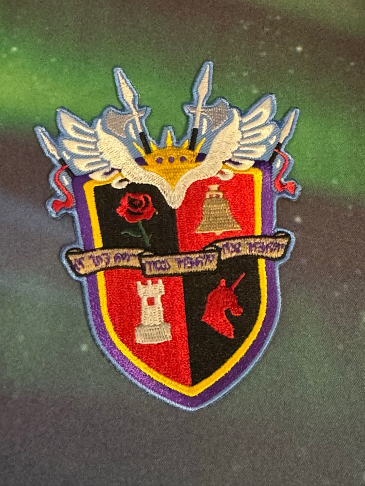 Photo of a patch of the Ishgardian coat of arms 