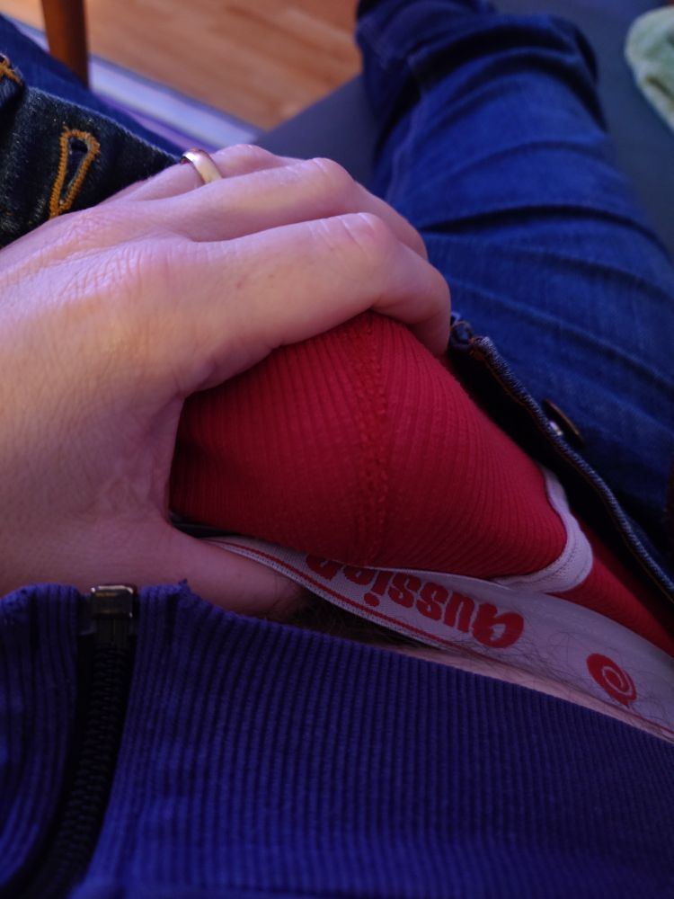 Me squeezing the bulge of my red briefs 