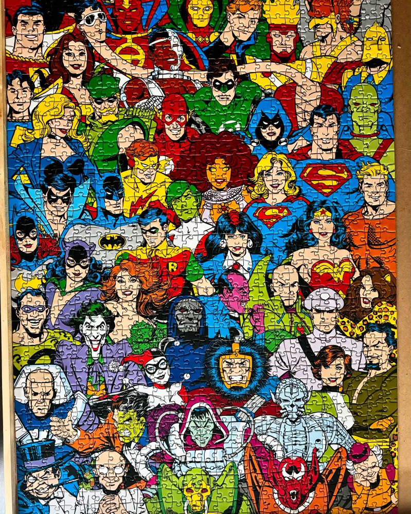 DC Comics 1000 piece puzzle featuring many characters