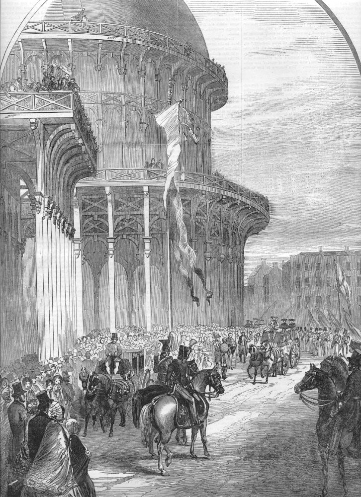 black and white lithograph of the front of the 1853 Exhibition hall in Dublin, showing the royal parade as Queen Victoria visited, published in the Illustrated London News