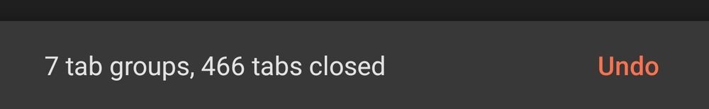 This image shows a notification banner or toast message with a dark background. The message reads "7 tab groups, 466 tabs closed" in white text, with an "Undo" button or link visible in coral or salmon pink color on the right side. This appears to be a browser interface element that confirms a bulk tab closing action while providing the option to reverse it. The design follows a minimal, modern aesthetic typical of contemporary web browsers.