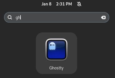 The image shows an app icon for "Ghostty" displayed on what appears to be a dark system interface. The icon features a minimalist design with a terminal command prompt symbol (>~) in white against a deep blue background, enclosed in a rounded square with metallic borders. The icon is positioned centrally on a dark gray background, with a search bar visible at the top of the screen showing "gh" as input. The timestamp "Jan 8 2:31 PM" is displayed in the upper left corner.
