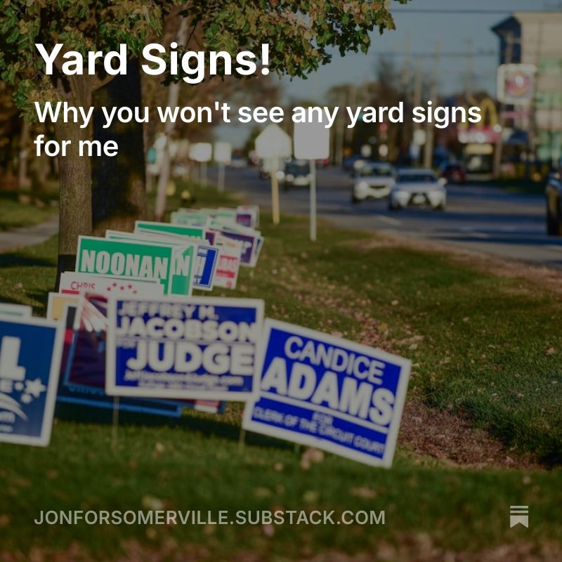 TEXT: Yard Signs! Why you won't see any yard signs for me. jonforsomerville.substack.com

IMAGE: a random suburban street with dozens of yard signs along side it.