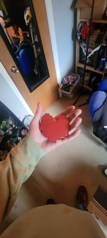 pic of my hand holding a [heart shaped object]