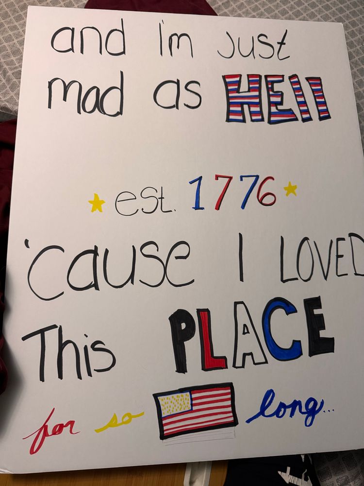 A poster that reads and I’m just mad as hell cause I loved this place for so long established 1776