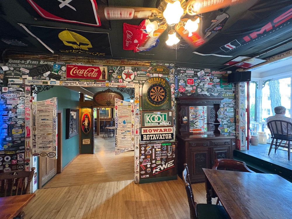 Various Motorsport themed decorations along the walls of the tavern