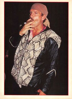 Jesse Ventura smoking a cigar