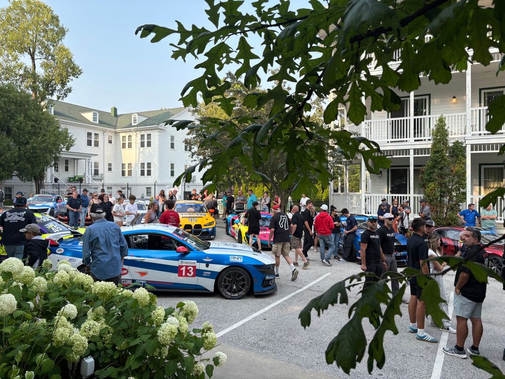 Commons area of Siebkens Resort with assorted GT cars parked