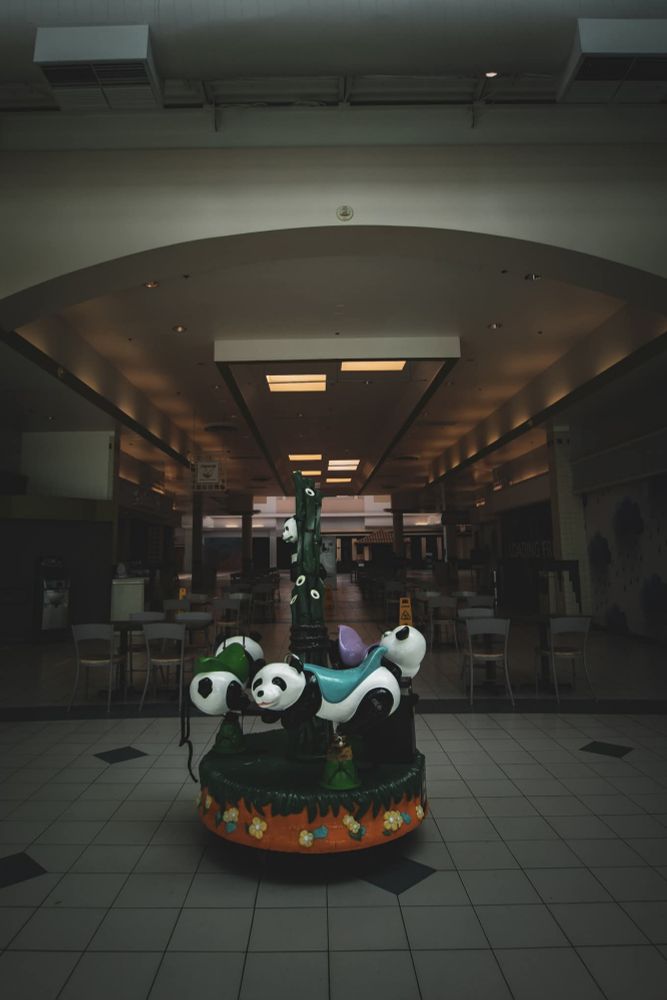 Panda merry-go-round in an abandoned Mall
