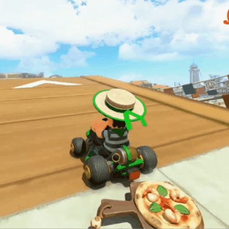 gif Luigi from Mariokart World direct wearing a stereotypical Italian striped shirt and hat dragging a pizza behind his kart 