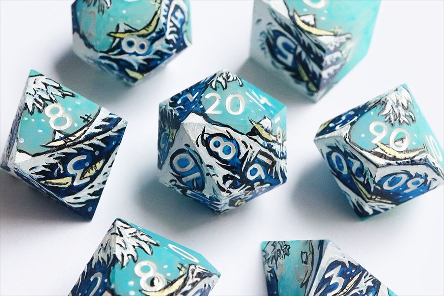 Full set of Great Wave gaming dice on a white background with the D0 in the center. The dice are a matte hand-painted scene of boats on a wave reminiscent of The Great Wave off Kanagawa by Hokusai. 