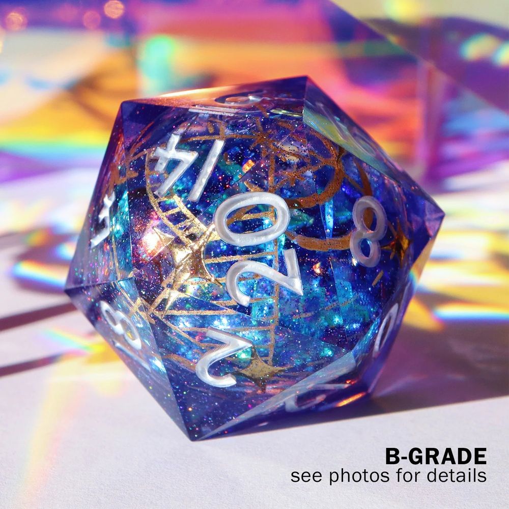 Image of the Luxon Beacon D20. The die is a 40mm liquid core die with purple resin, shimmering glitter, and gold arcane symbols around the liquid core. The text reads “B-Grade see photos for details”