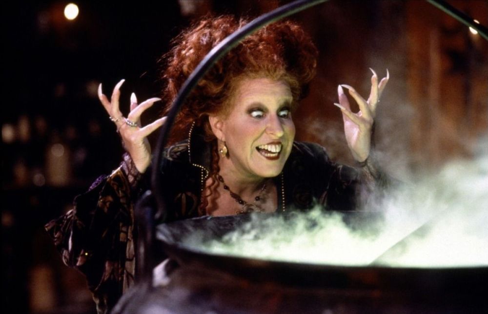 Winnie Sanderson hovers over a steaming cauldron. She’s alive and ready to fuck shit up