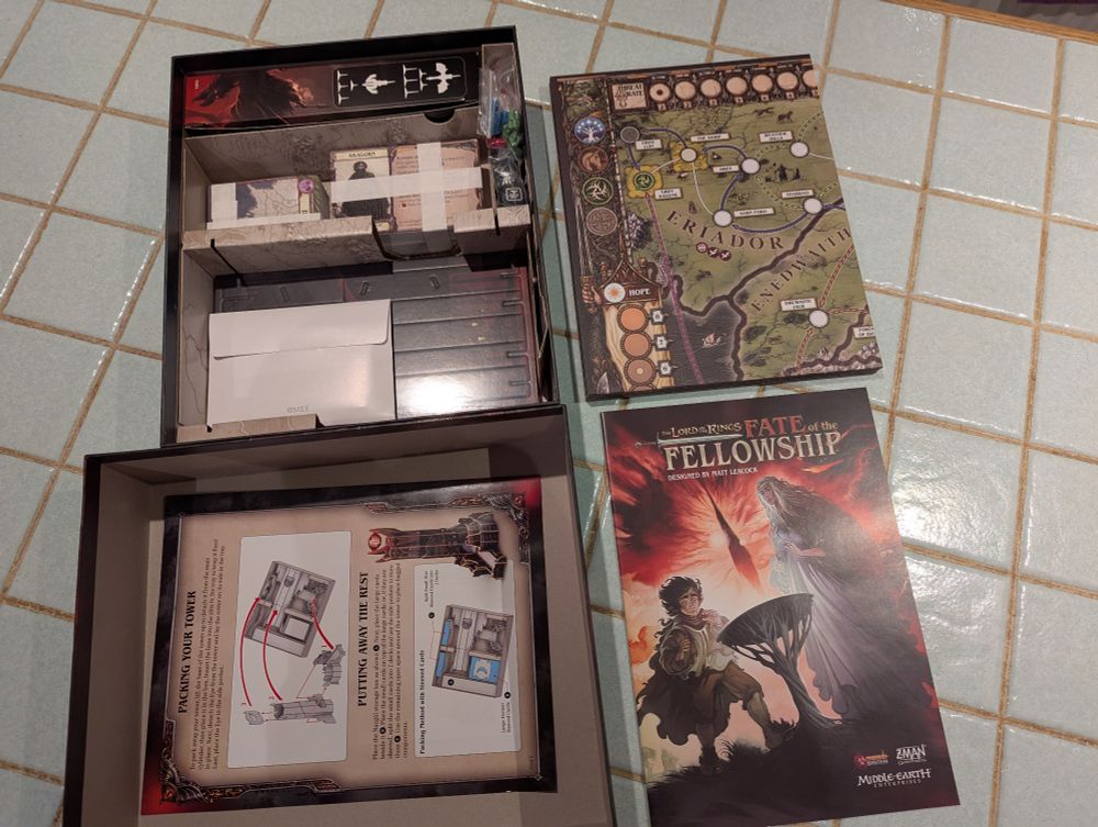 Starting to unpack Lord of the Rings: Fate of the Fellowship board game.