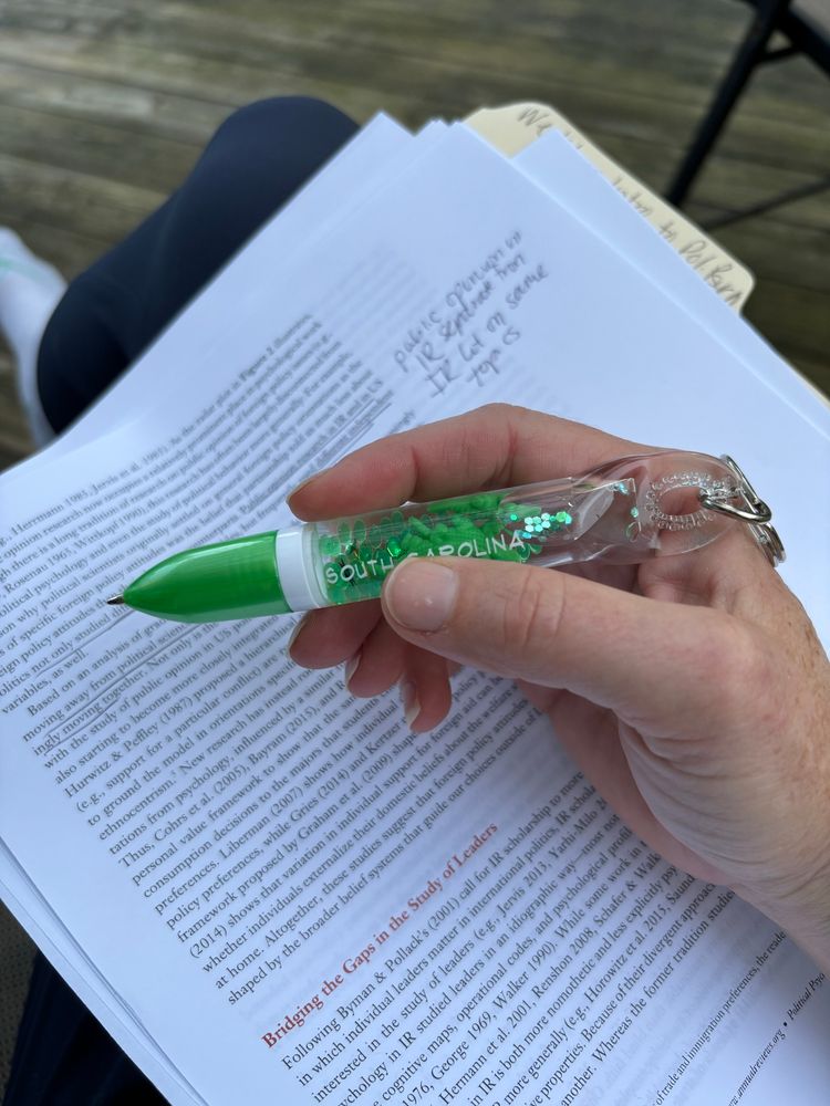 Shirt green pen with words South Carolina on it and small sparkly alligators 