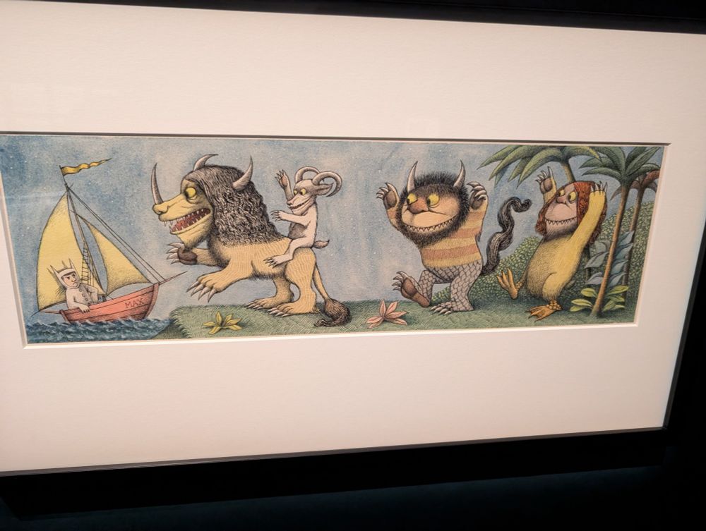Page of monsters and Max in his boat from Where the Wild Things Are.
