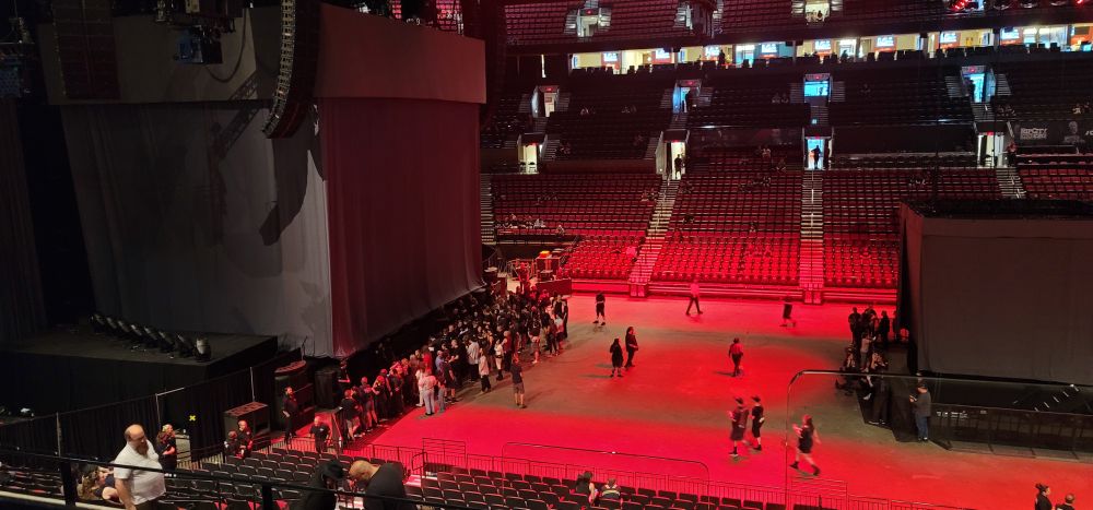 Photo from an elevated seat of the stage and mosh pit before a Nine Inch Nails concert.