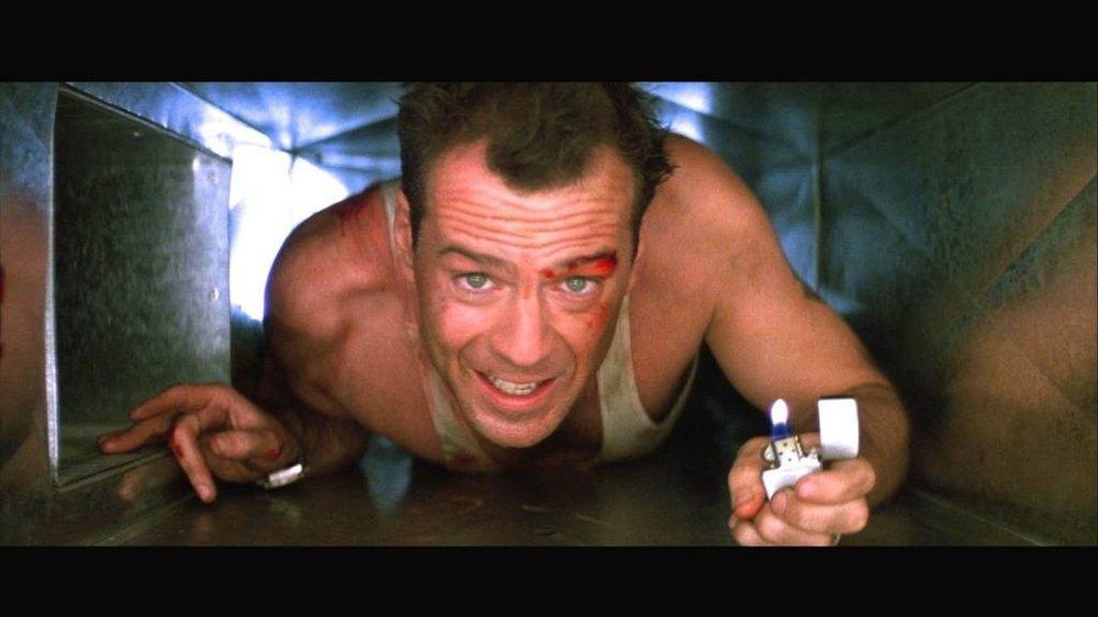 John McClane crawling in a vent in DIE HARD
