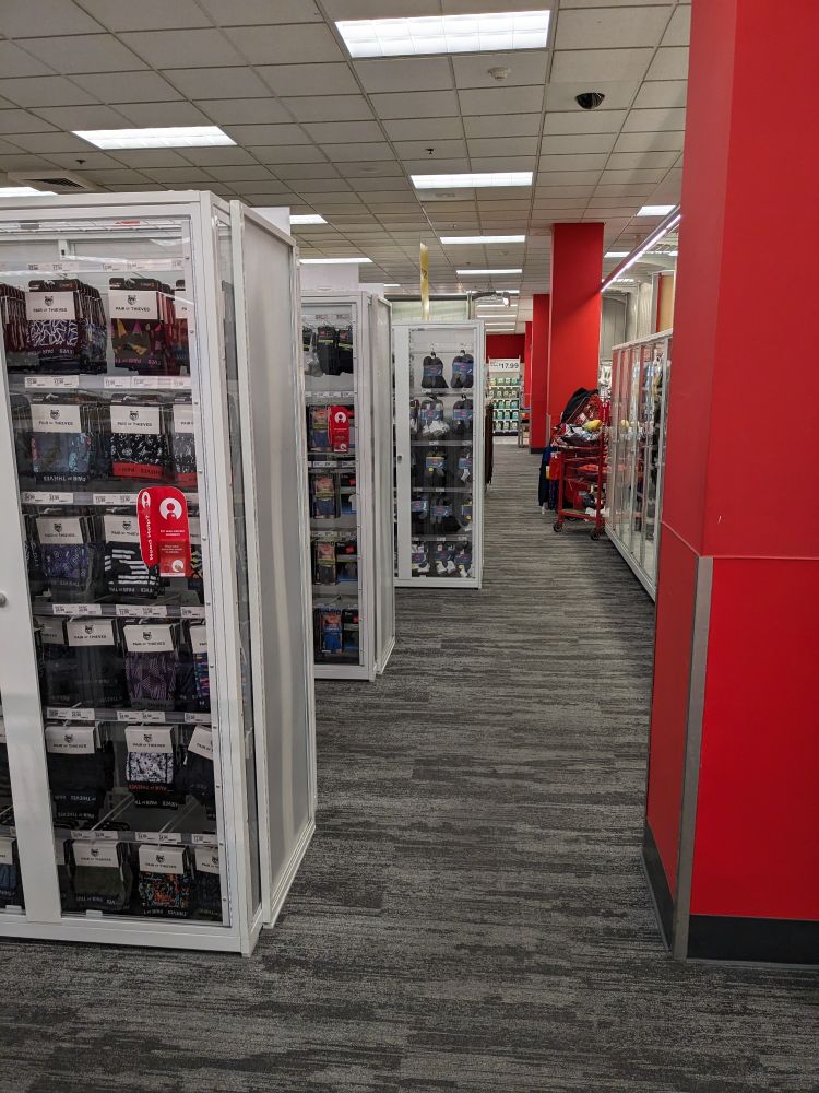 Shot of a bunch of socks and underwear in locked cases as Target continues to pretend it's dealing with ludicrous levels of theft.