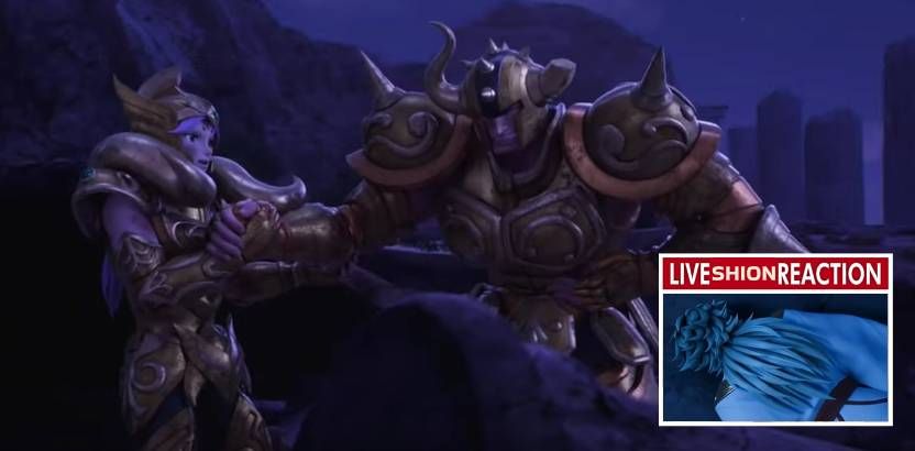 It's a shot of Aries Mu and Taurus Aldebaran holding hands, with a shot of Aries Shion dead. text on image: Live Shion Reaction.