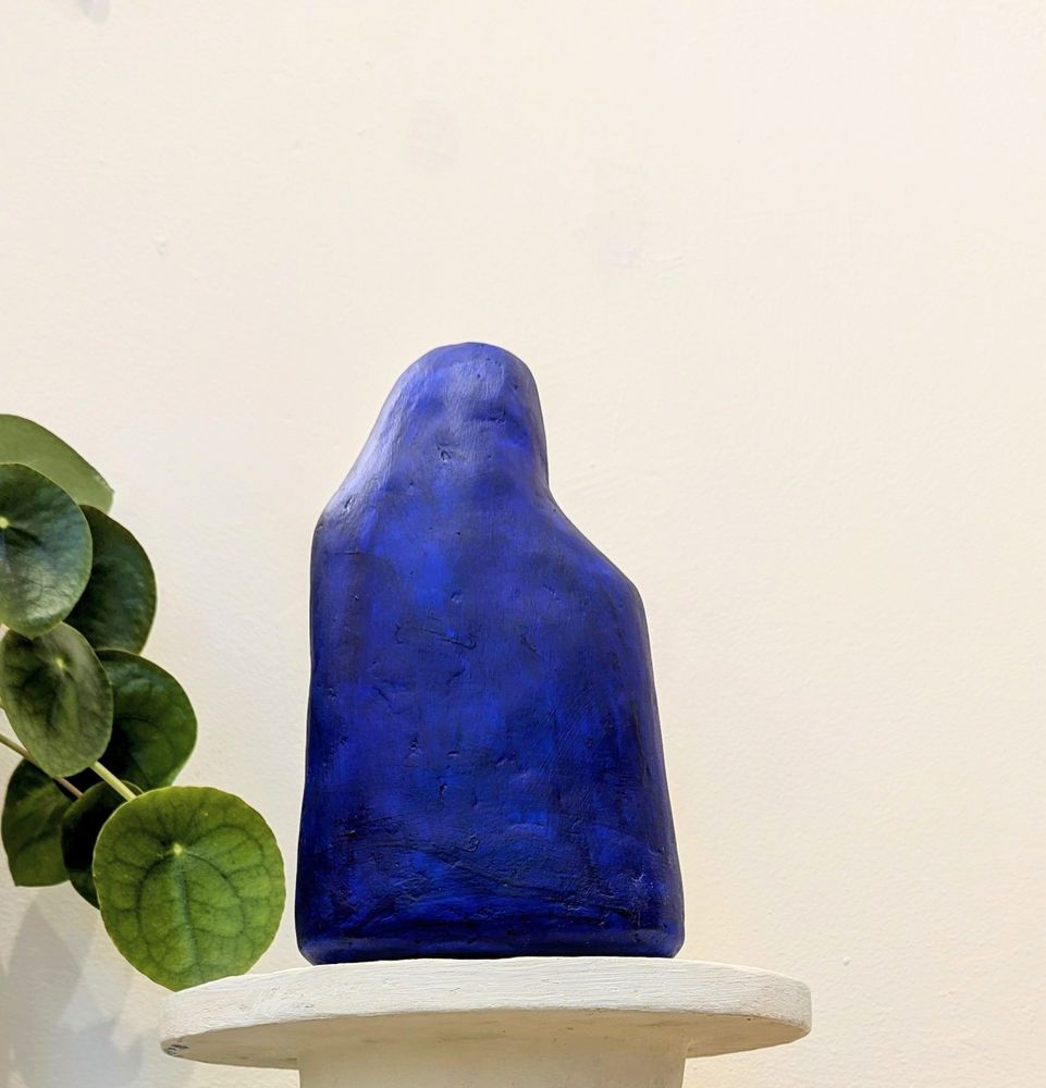 Cobalt blue vessel, inspired by antiquity, made from scrap paper and plaster with a water tight reclaimed plaster lining.