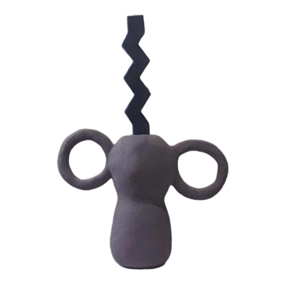 Vase and/or chunky candle holder. Made with pulped paper and plaster. Lined with reclaimed plastic to make it watertight. £28. Limited edition of one.