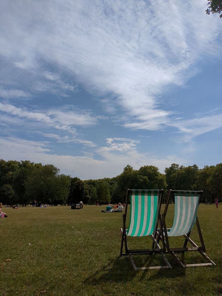 A pair of deck chairs in the sun