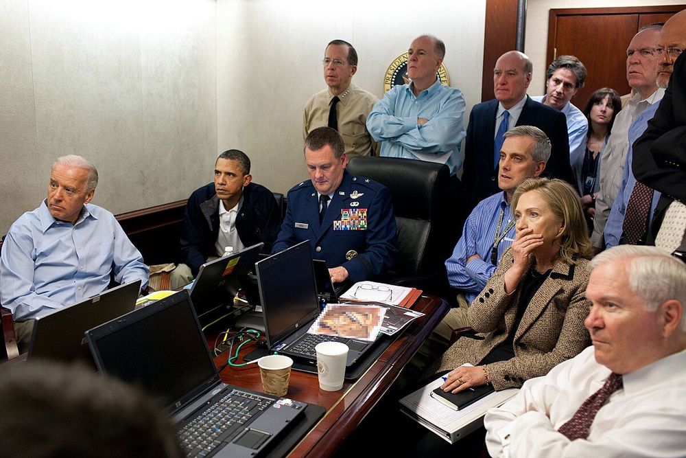 Obama administration sitting in the situation room during the Bin Laden raid. 