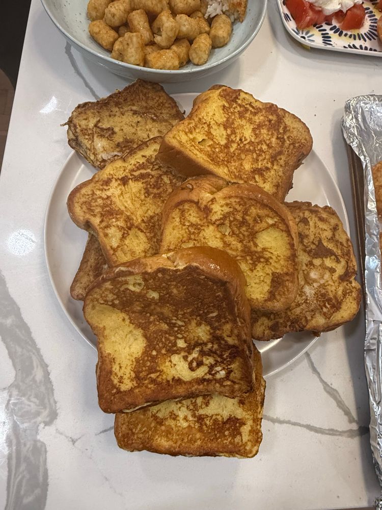 A plate of immaculate looking French toast.