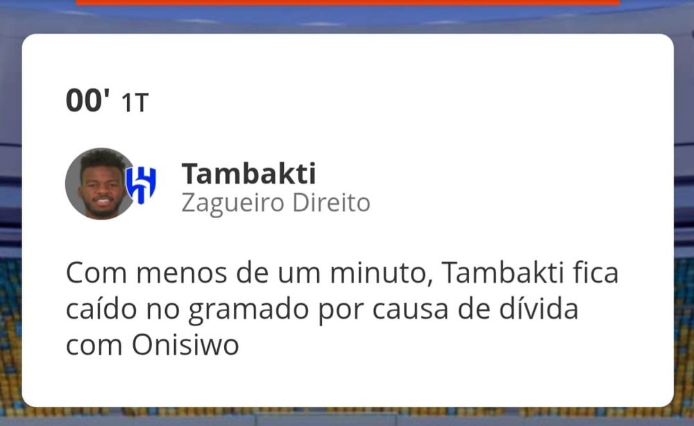 print do minuto a minuto do globo esporte marcando 0 minutos transcorridos do primeiro tempo e em destaque o zagueiro direito do Al-Hilal, Tambakti, com o texto: "Com menos de um minuto, Tambakti fica caído no gramado por causa de dívida com Onisiwo"