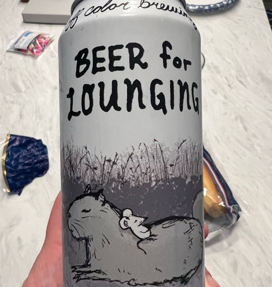 Off color brewing’s can of “Beer for Lounging.” Which has a mouse sleeping on the back of a peaceful as fuck capybara