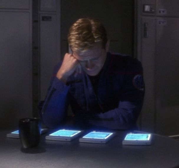 Trip looking at four PADDS on a table