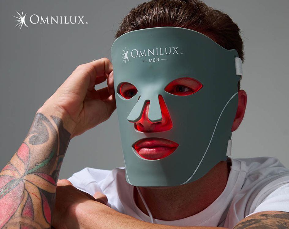 An ad for the OMNILUX mask, and a guy wearing said mask