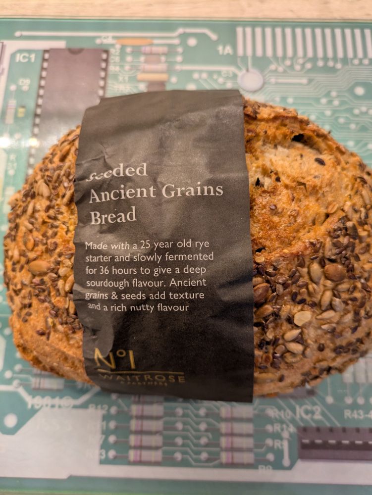 Loaf of seeded ancient grains bread.