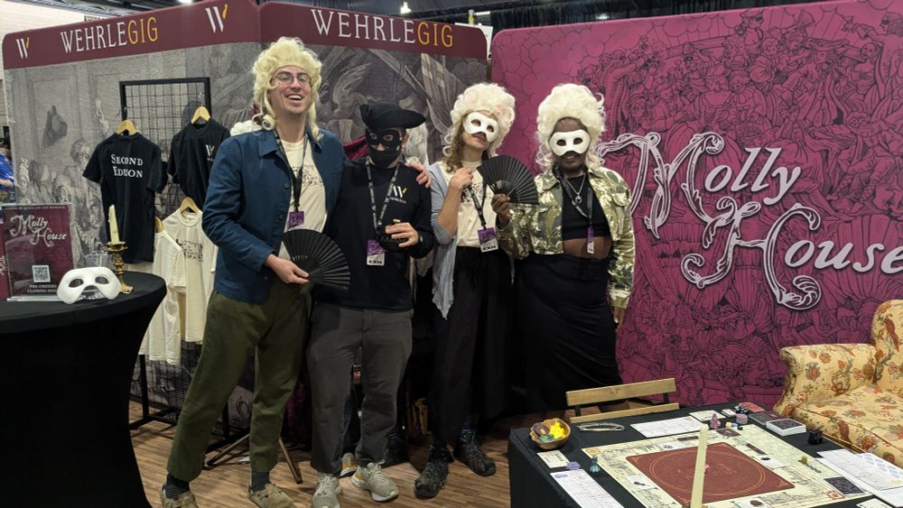 Molly house PAXUnplugged Booth. In period costume and wigs, posing and having fun!