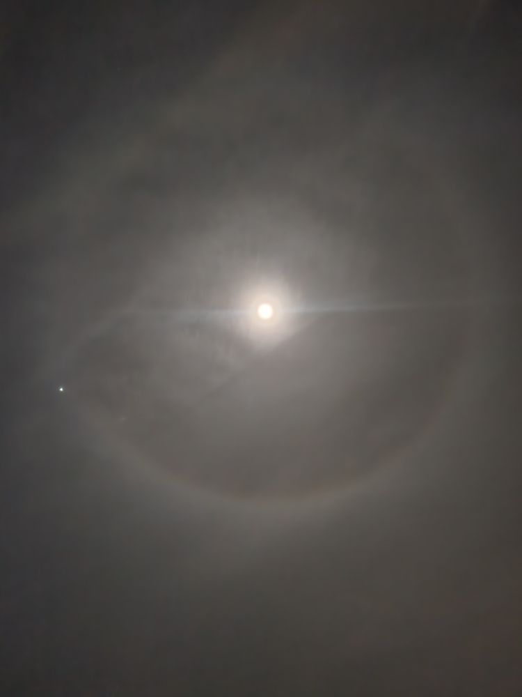 Moon with a halo around it