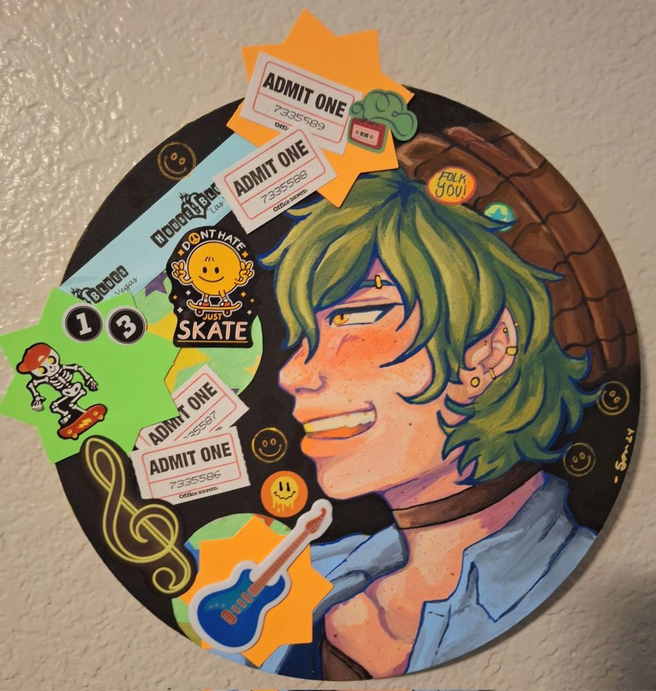 a mix media painting of my character Kim. it's a side profile of them smiling with an open mouth. they have yellow eyes and green hair with freckled pale skin. they were a brown beanie with a yellow pin that says "folk you!" and a green pin with a blue star. they also have a matching brown undershirt and brown chocker. they were a blue button up as well as multiple gold ear piercings and an eyebrow piercing. Next to the painting is a collage of stickers, colorful papers, and "admit one" tickets. Some stickers of note are a yellow treble clef note, blue guitar, a skateboarding skeleton with a backwards cap, a red cassette tape, and a smiley face making a peace sign with the text "Don't hate, Just Skate." There is also a concert venue wrist band in baby blue for the House of Blues venu in Las Vegas. 