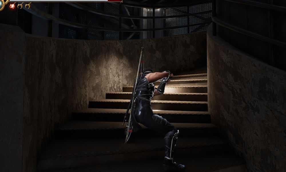 Ryu Hayabusa from Ninja Gaiden II Black standing on the stairs in the Statue of Libery, which are definitely not to scale.