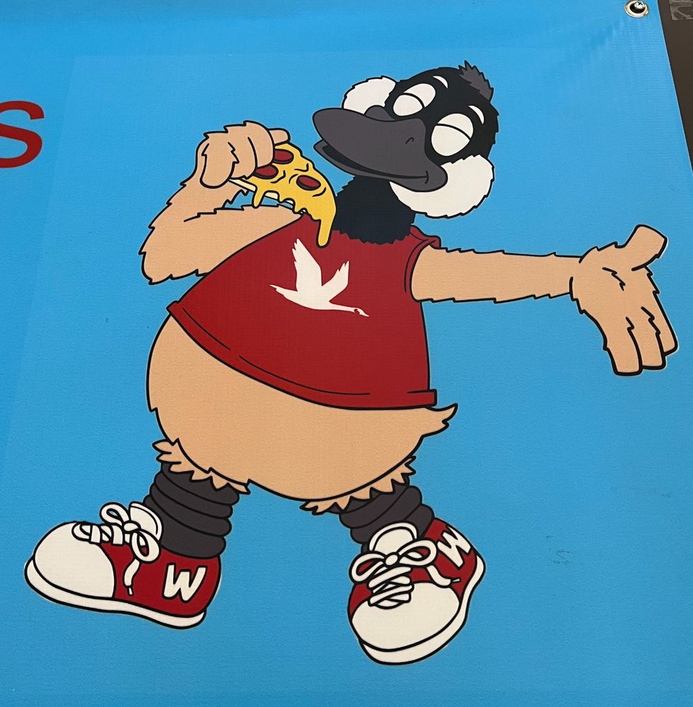 Wawa bird happily eating a slice of pizza