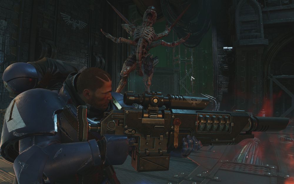 Foreground has a space marine wielding a sniper rifle, a taloned Tyranid leaps directly at his unprotected head