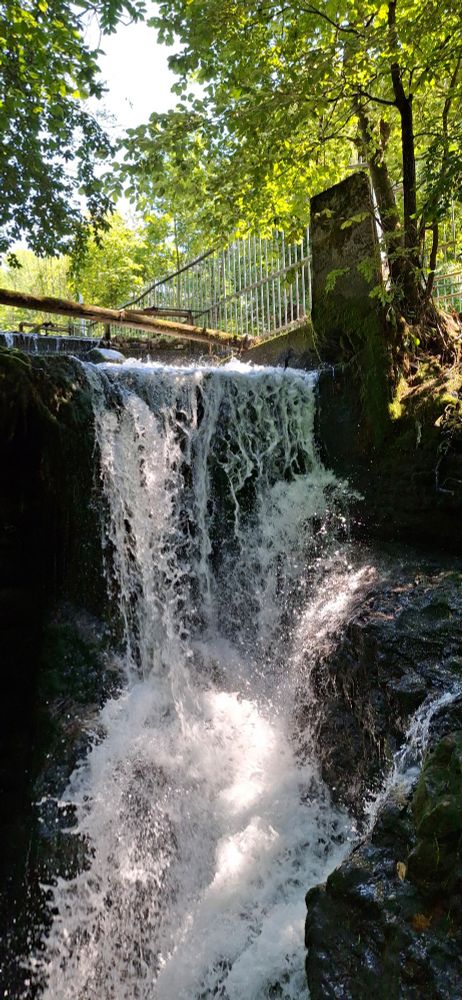 One medium sized waterfall and a smaller one