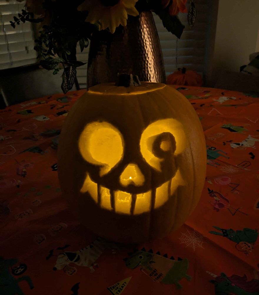 A pumpkin carved with Sans' likeness.