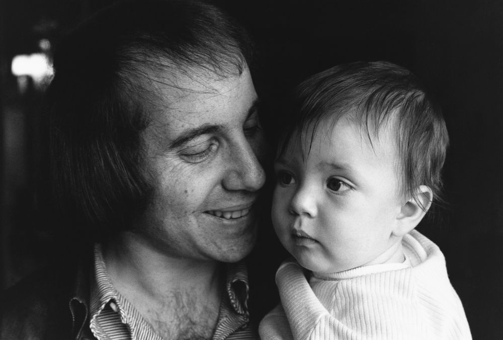 Paul Simon with his baby son Harper
